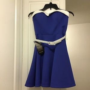 Never worn with tags. Blue 1950s inspired mini dress
